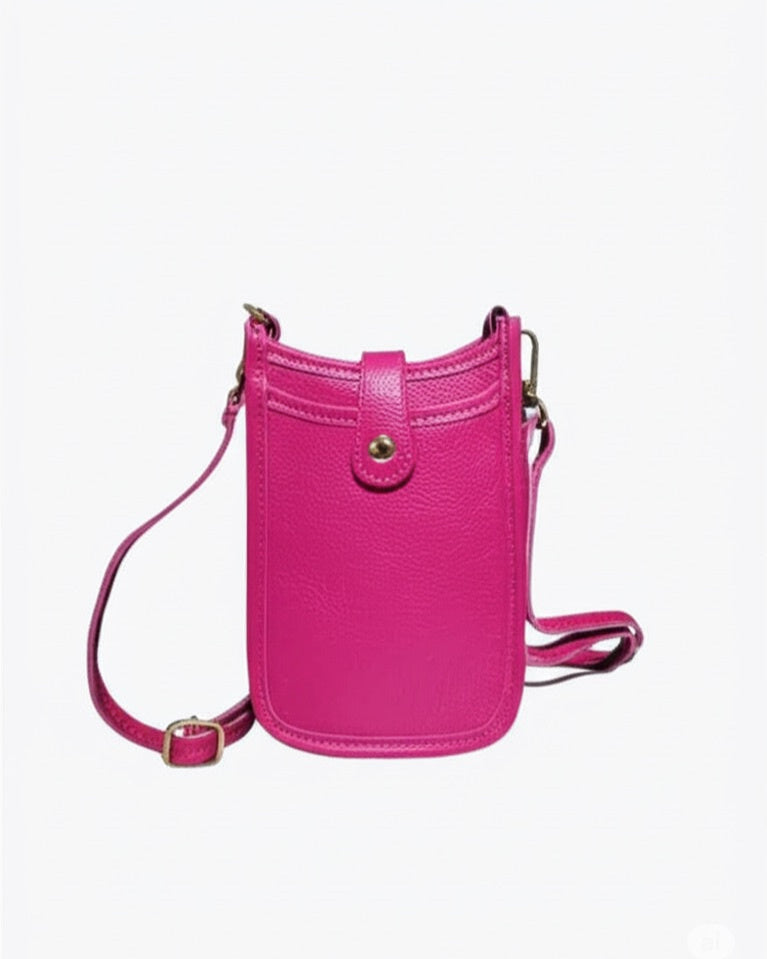 Pink crossbody bag on a white background